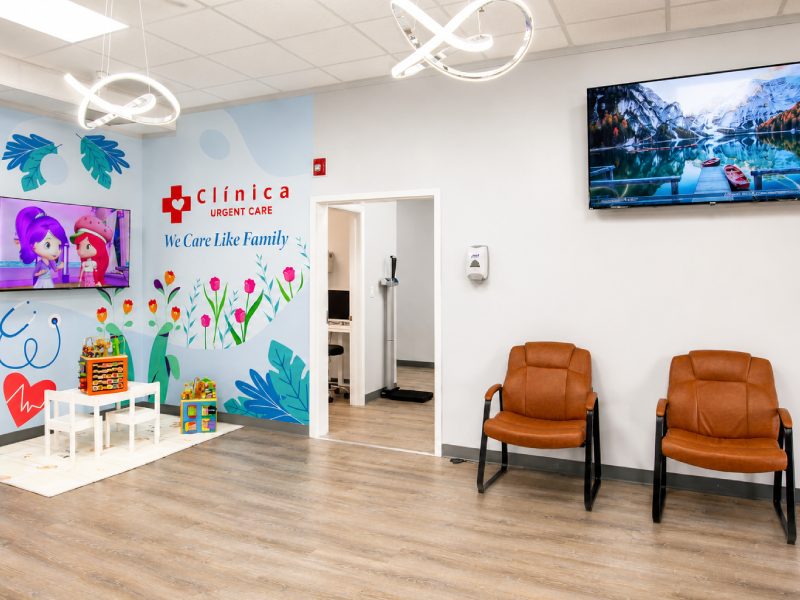 Waiting area with children's corner at Clinica Urgent Care